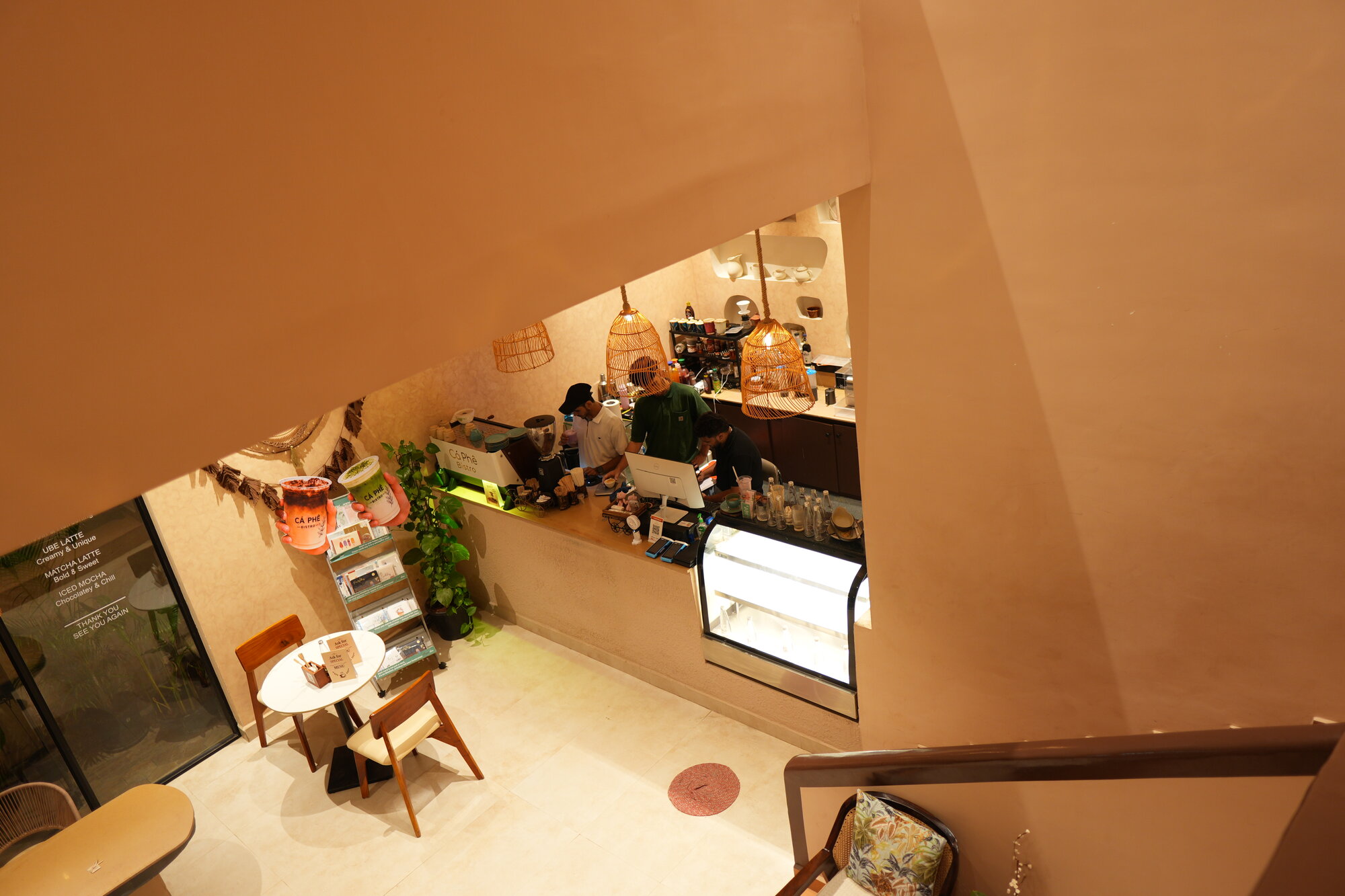 Overhead view of the espresso counter and staff at work