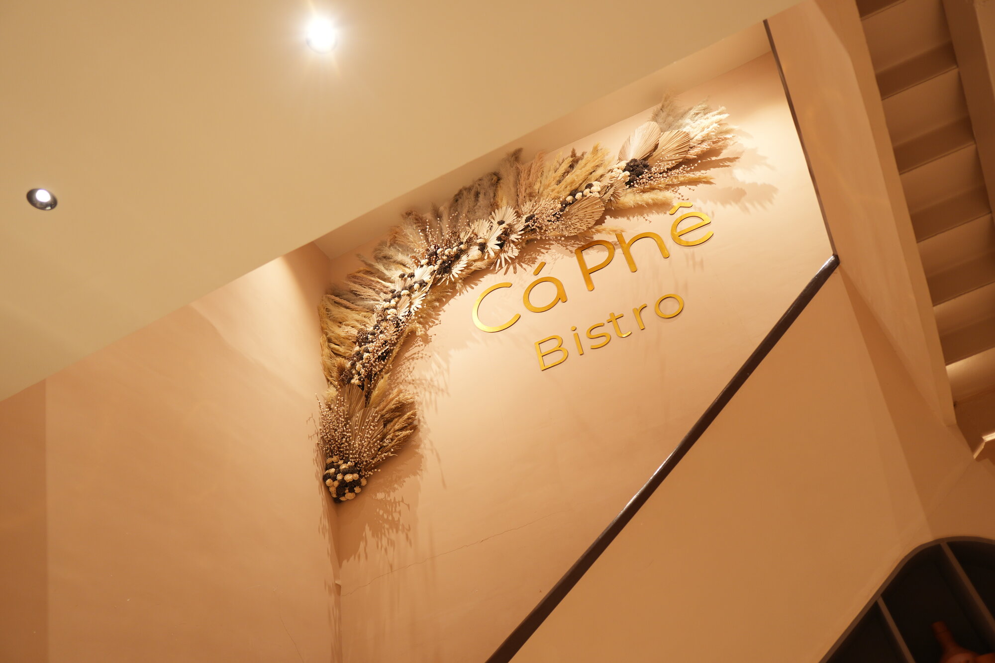 Cafe interior seating with Vietnamese specials menu